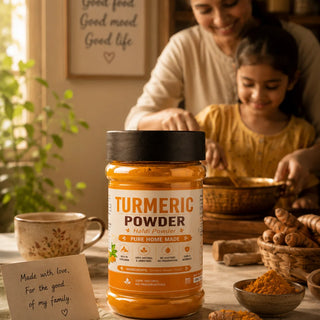 stone-ground turmeric powder over daal, showing fine natural texture